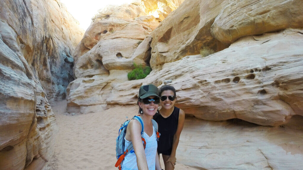 women on white domes hike