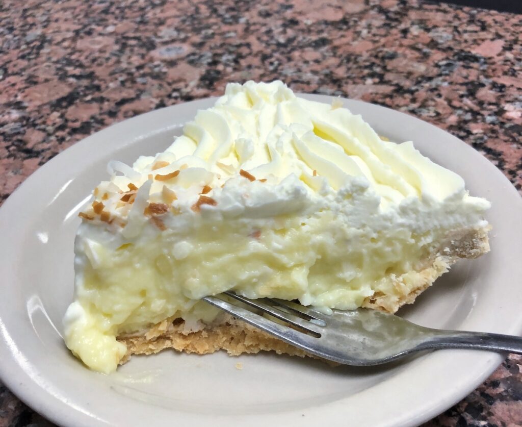 A piece of coconut cream pie from Blue Bonnet Cafe
